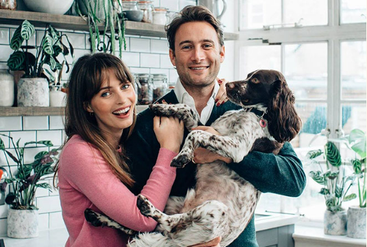 Photo of Ella and Matt Mills with their dog